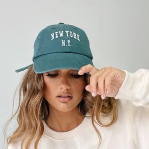 Princess Polly green New York hat